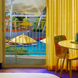 Rooms balcony with view pools.