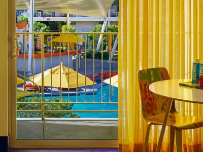 Rooms balcony with view pools.