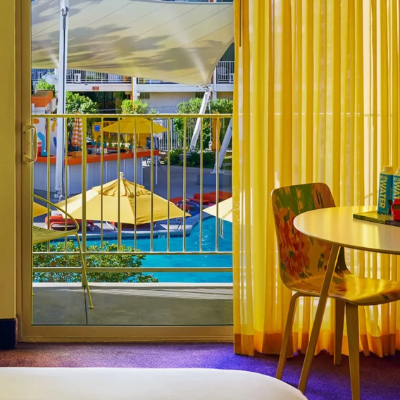 Rooms balcony with view pools.